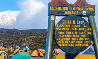 Camping on mount Kilimanjaro in tents to see the glaciers in Tanzania, Africa