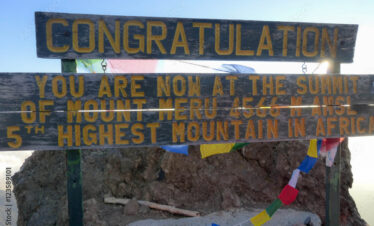 summit sign on Mount Meru in Arusha National Park